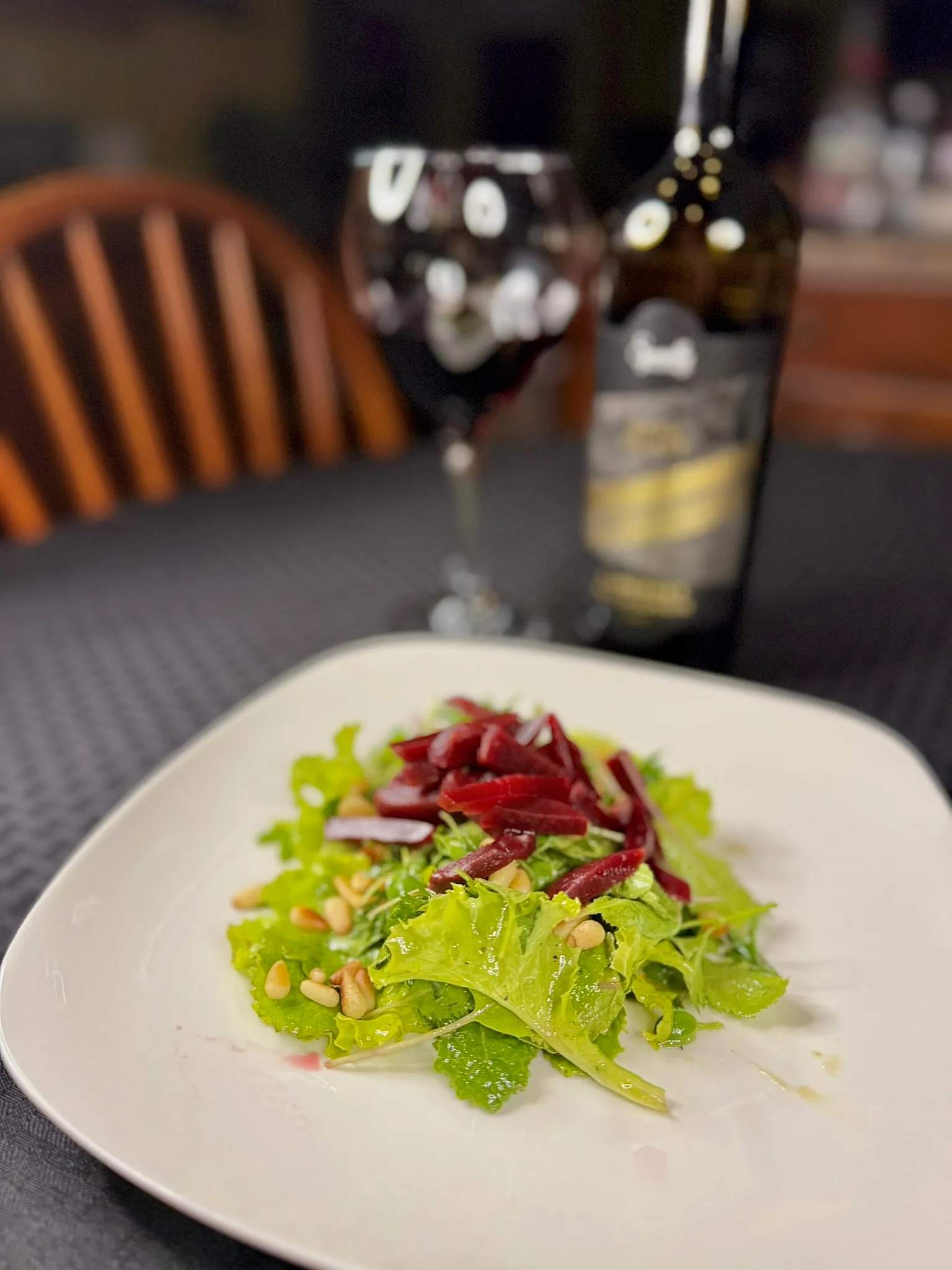 A vibrant roasted beet and fresh greens salad