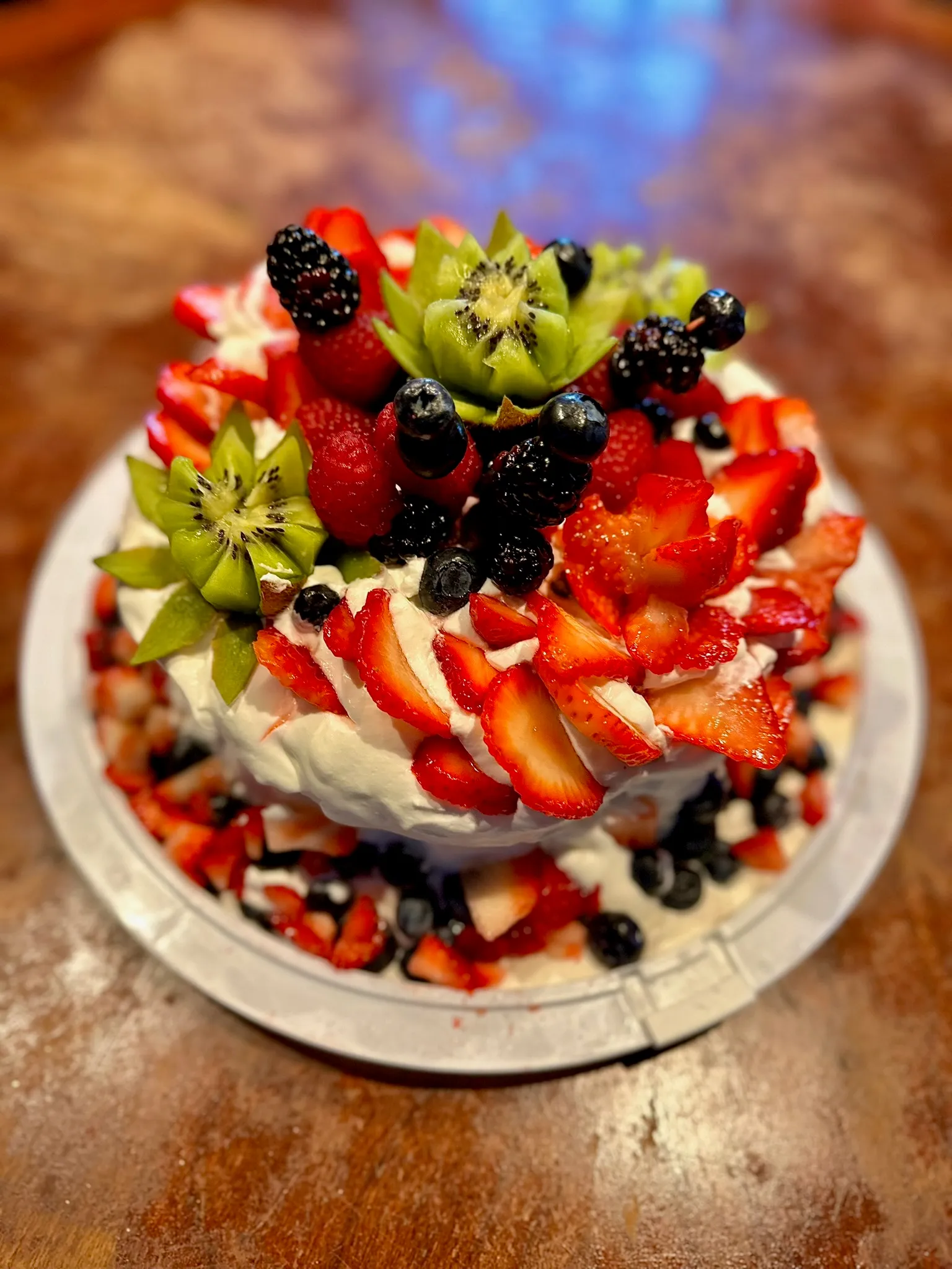 Fresh fruit cream cake topped with berries